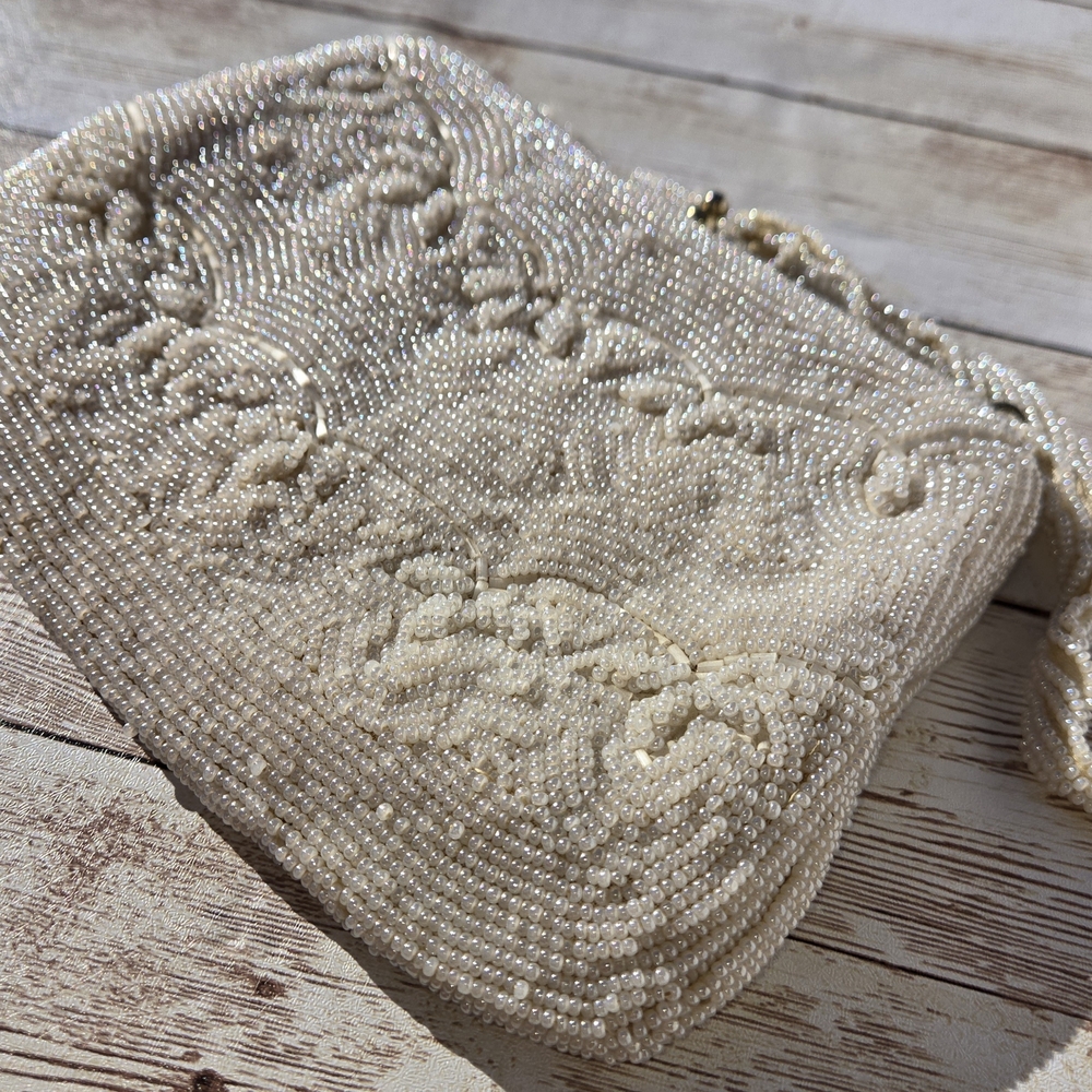 Elegant Beaded Cream Clutch